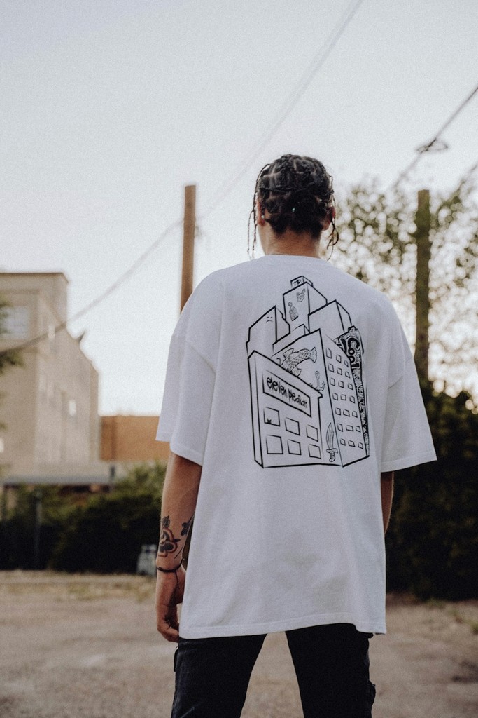 Concrete Jungle Tee flat lay